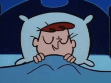 a cartoon character is laying in bed with a pillow and a blanket .