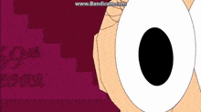 a close up of a cartoon character 's eyes with a black circle in the middle of them .