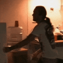 a blurry picture of a man with a ponytail
