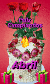 a birthday cake with flowers and the name abril written on it