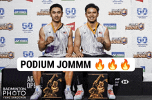 two athletes are sitting on a podium with the words podium jommm on the bottom