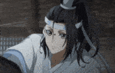a close up of a person with long hair and a ponytail