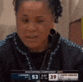 a woman is crying while watching the ncaa national championship