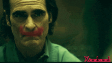 a close up of a man 's face with red lipstick and the words xiamhemuk
