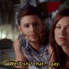 a man and a woman are sitting next to each other and the man is saying well isn 't that gay