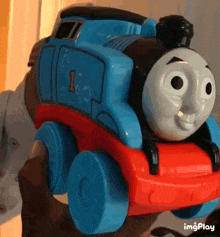 a toy train with the number 1 on the side