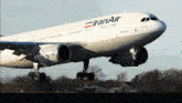 a large iran air plane taking off from a runway