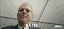 Kneel General Kick Grabaston GIF - Kneel General Kick Grabaston Noah Emmerich GIFs