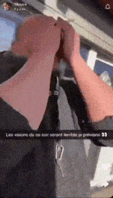 a snapchat of a man covering his face with his hands with the caption les visions de ce soir seront terrible je previens
