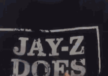 a close up of a sign that says `` jay-z does it ''
