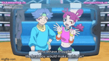 a boy and a girl are standing next to each other in front of a tablet and talking .