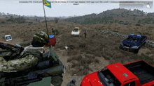 a screenshot of a video game shows a yellow car and a red truck in the foreground and commander ppg in the background