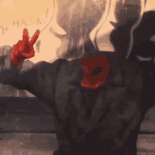 a painting of a person giving a peace sign with the word women written on the wall behind them