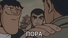 a group of men are standing next to each other and one of them is holding another man 's arm .
