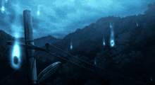 a picture of a telephone pole with ghosts coming out of it at night