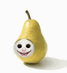 a pear with a cat 's face on it .