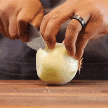 Chopping An Onion Lovefoodmore With Joshua Walbolt GIF - Chopping An Onion Lovefoodmore With Joshua Walbolt Cutting Up An Onion GIFs