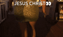 a woman in a dress is dancing in front of a sign that says jesus christoo on it