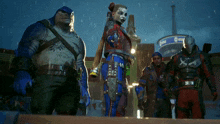 a group of people are standing in front of a building that says ' pepsi ' on it