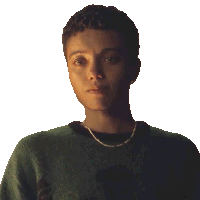 a woman in a green sweater is listening
