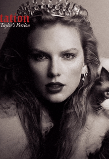 a woman with a tiara on her head is holding a cat in a black and white photo
