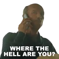 a man talking on a cell phone with the words " where the hell are you " above him