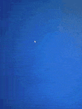 a computer generated image of a robot with glowing blue arms and legs