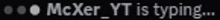 a blurry image of the words mcker it is typing