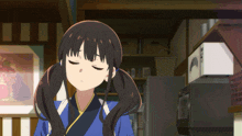 a girl with pigtails is standing in front of a microwave