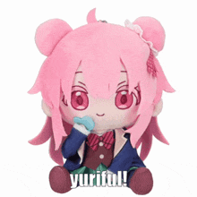 a stuffed doll with pink hair and the words yuriful written on it