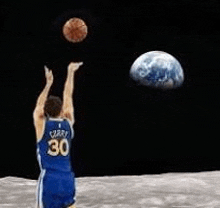 a basketball player is throwing a basketball in the air .