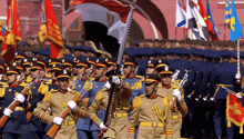 a group of soldiers marching in a parade with flags and a flag that says ' russia ' on it
