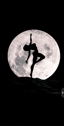 a silhouette of a person dancing in front of a full moon