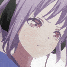 a close up of a girl with purple hair