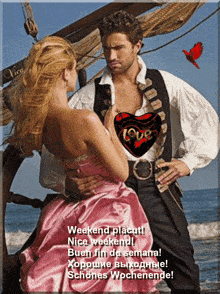 a picture of a man and a woman on a boat with a heart that says love on it