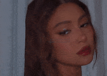 a close up of a woman 's face with a watermark that says ' python '
