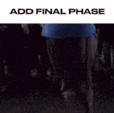 a man in a blue shirt stands in front of a crowd with the words add final phase above him