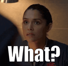 a woman with a questioning look on her face and the words what written above her