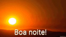 a sunset with the words boa noite in white