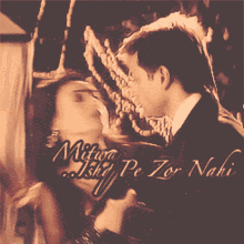 a painting of a man and woman kissing with the words mitaar ishq pe zor nahi on the bottom
