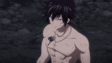 a shirtless anime character with a fairy tail tattoo on his chest
