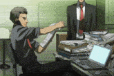 a man sitting at a desk holding a piece of paper that says ' i 'm sorry '