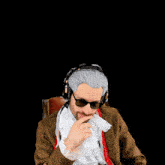 a man wearing a wig and sunglasses is giving a thumbs up