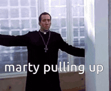 a priest with his arms outstretched and the words marty pulling up