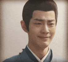 a close up of a man with his eyes closed