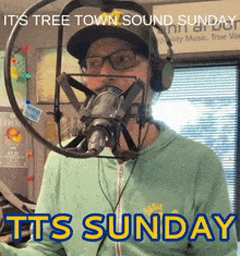 a man in front of a microphone with the words it 's tree town sound sunday tts sunday behind him