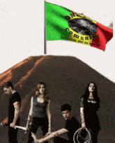 a group of people standing in front of a flag that says communit