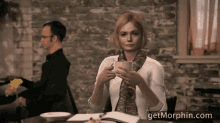 Elle Fanning Coffee Cup GIF