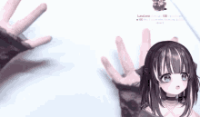 a girl with a ring on her finger is being held by someone 's hands