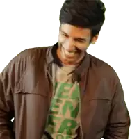 a man wearing a brown jacket and a green t-shirt that says ' hulk ' on it